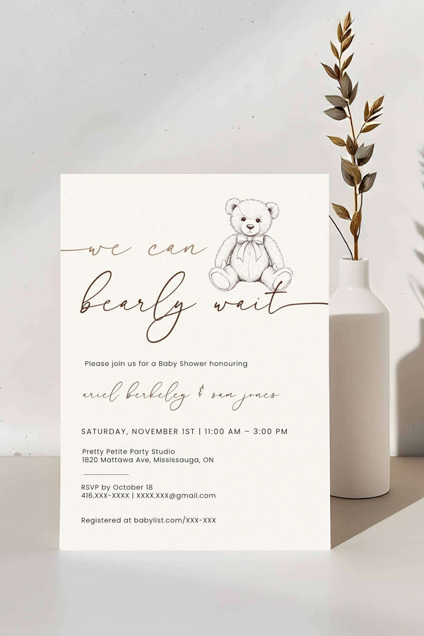 Baby shower invitation with teddy bear illustration on a white background